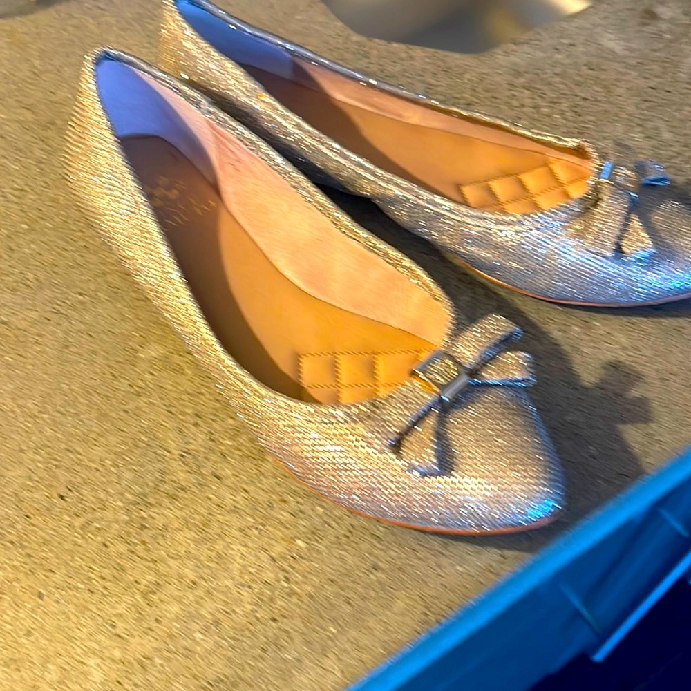 Vince Camuto flats.Worn only one time!